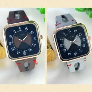 Aa1 TOMI Stylish Watch For boys and girls leather strap , tow tone watch(with box)